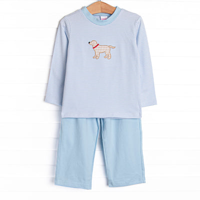 This set features a light blue striped print, a puppy applique, and light blue pants to match. This set will start a howl!