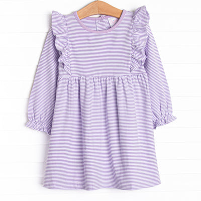 The dress features ruffle trim, purple stripes, and soft knit material.