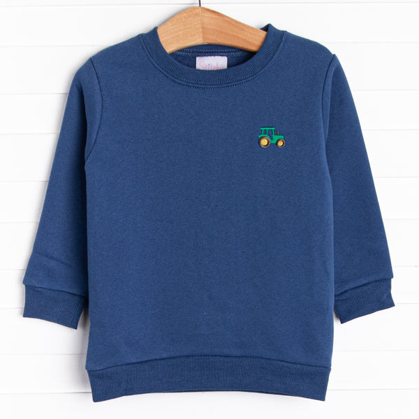 French Terry Navy sweatshirt with a green tractor embroidery.