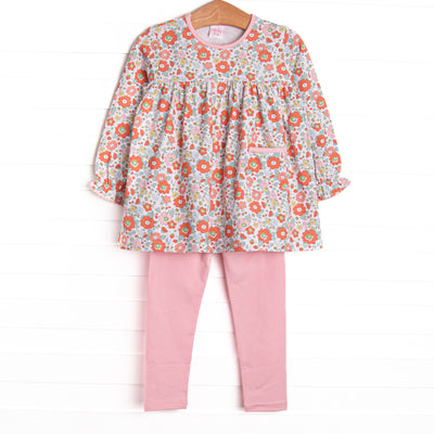  This set features a pink floral print, front pocket, and pink leggings to match. 