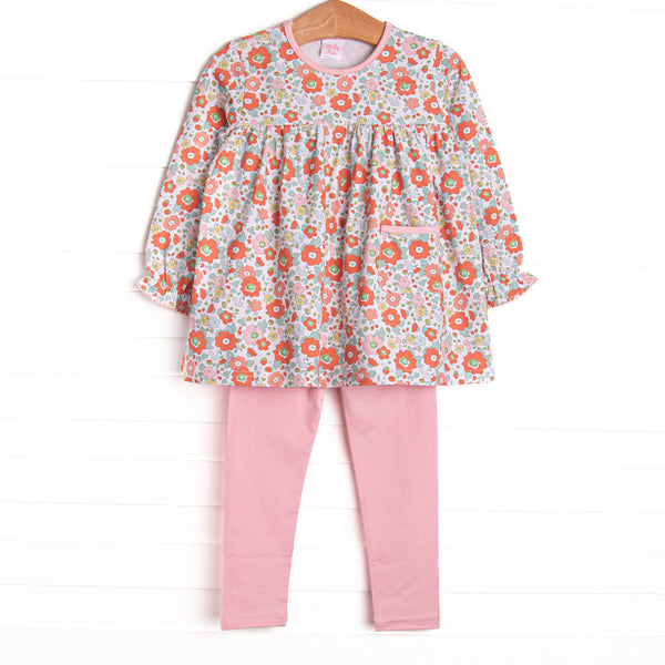  This set features a pink floral print, front pocket, and pink leggings to match. 