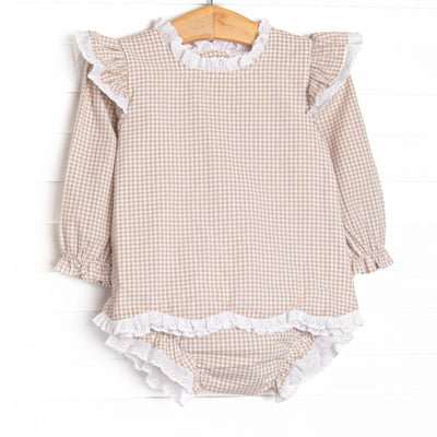 This set features a tan gingham print, an eyelet trim, and scalloped edges. Coordinating diaper cover to match.