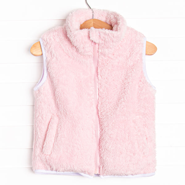  This vest features the softest pink fuzzy fleece, pockets to keep little hands warm, and a full zipper down the front. 