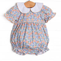 This bubble features a blue floral print, puff sleeves, and a peter pan collar.