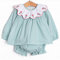 This set features a sage green gingham, a scalloped bib, and candy cane embroideries. Matching diaper cover to complete the set.