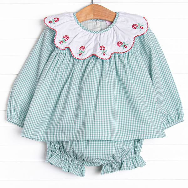 This set features a sage green gingham, a scalloped bib, and candy cane embroideries. Matching diaper cover to complete the set.