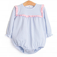 This cozy knit favorite is a staple for every little girl's closet. Featured here in light blue stripes and with pink ruffle trim!