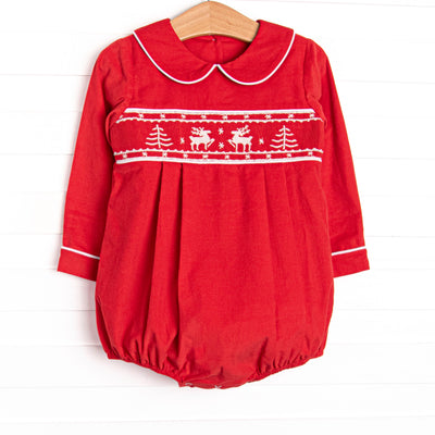  This bubble features a red corduroy material, peter pan collar, and reindeer smockings. 
