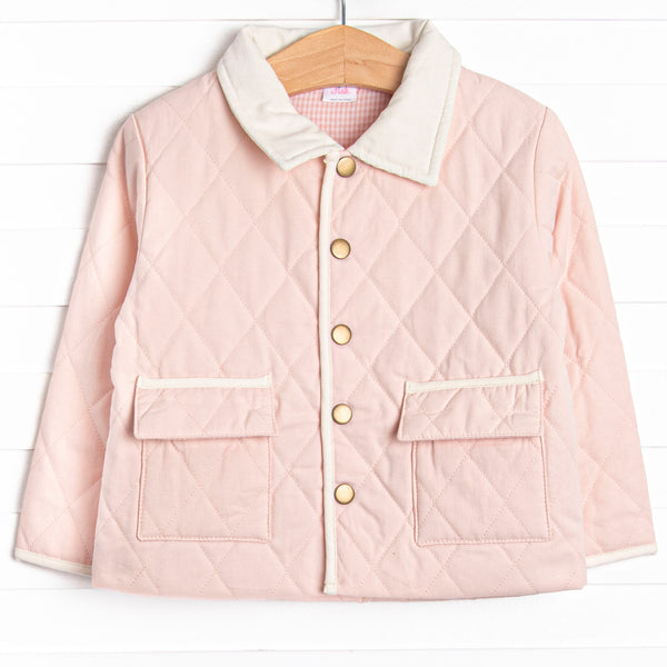  This coat features a pink quilted material, cream collar and trim, and pink&nbsp; gingham lining. 