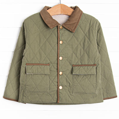  This coat features a green quilted material, brown collar and trim, and tan gingham lining. 