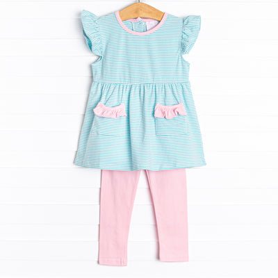 The&nbsp;set features mint green stripes, pink ruffle trim, and pink knit leggings.