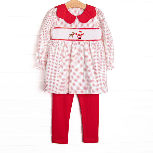 This set features a red bitty dot print, red scalloped collar, and a santa and his reindeer smocking.