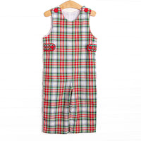  This Jon Jon features a red plaid print, red covered buttons, and smocked tabs on the sides. 
