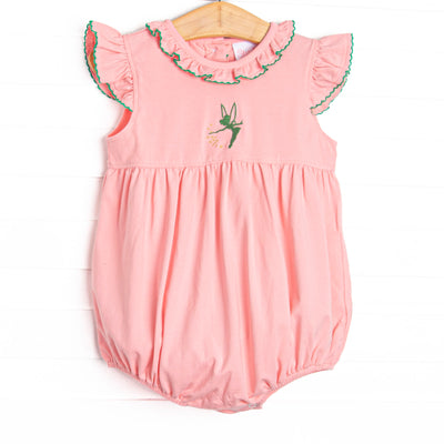  This bubble features pink fabric, a ruffle collar, and a Tinker Bell embroidery. 