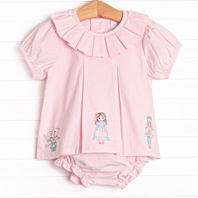  This set features a pink corduroy material, a ruffle collar, and a nutcracker embroidery. Matching pink corduroy diaper cover to complete the set. 