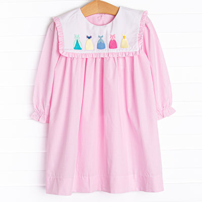  A long sleeve dress in a pink mini gingham print with a bib collar with the prettiest dress embroidery. 