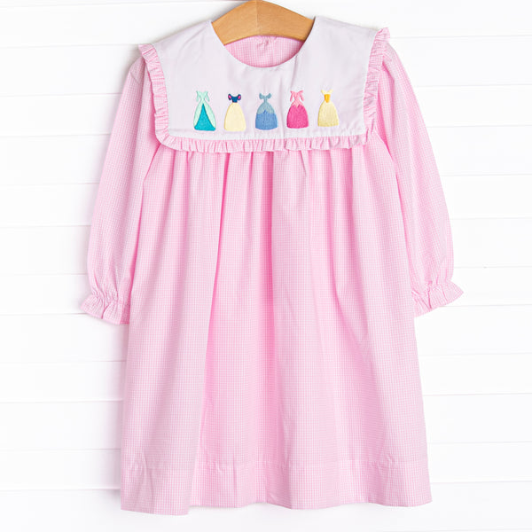  A long sleeve dress in a pink mini gingham print with a bib collar with the prettiest dress embroidery. 