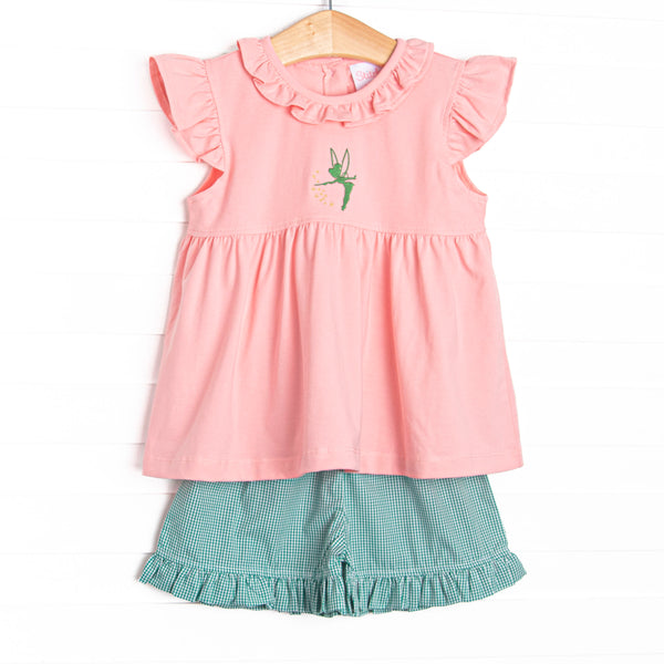 This set features pink fabric, a ruffle collar, and a Tinker Bell embroidery. Coordinating green gingham ruffle shorts to match.