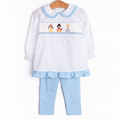This set features a long sleeve top in a blue bitty dot print, a peter pan collar with blue ruffle trim, and princess smocking. Coordinating blue leggings to match.