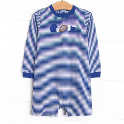  This romper features a blue striped print, snaps on the stride, and a football applique. 