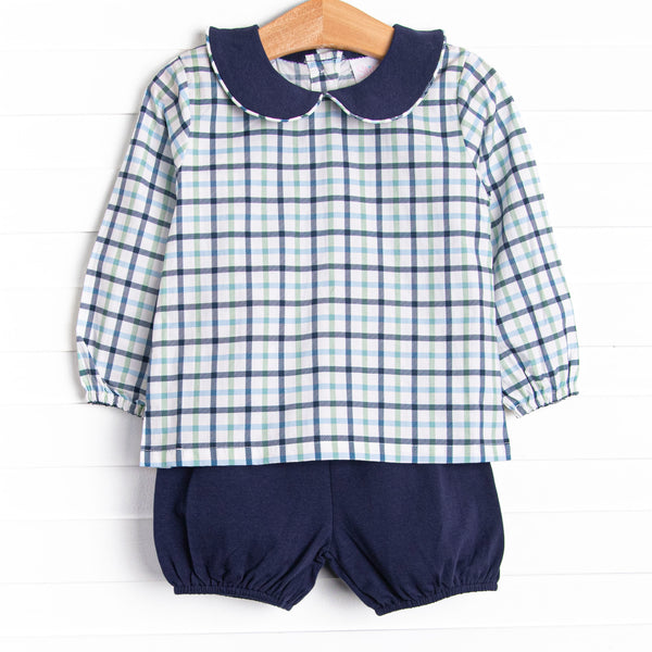 This set features a blue plaid print, a navy blue peter pan collar, and a navy bloomer short to match.