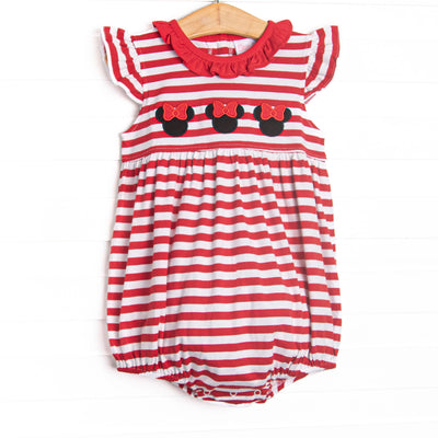  This bubble features a red striped print, a red ruffle collar, and a trio of mouse appliques. 