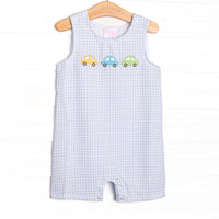 This set&nbsp; features a light blue gingham print, snaps on the stride, and&nbsp; trio of cars appliques.