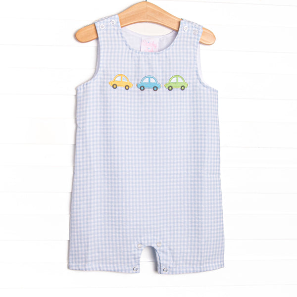 This set&nbsp; features a light blue gingham print, snaps on the stride, and&nbsp; trio of cars appliques.