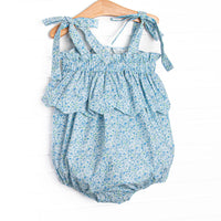 This bubble features a blue floral print, elastic band on top, and scalloped trim