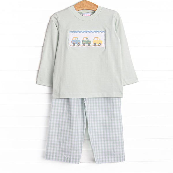 This set features a pale green material, a trio of cars smocking, and green gingham pants to match.