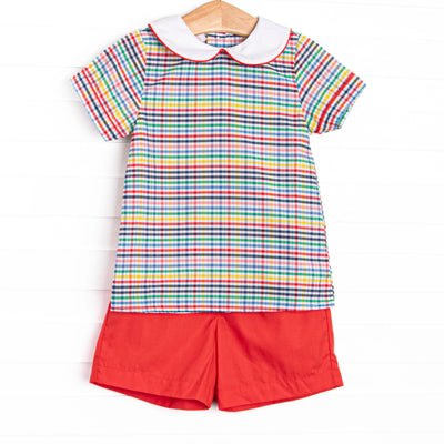 This set features a plaid top with a peter pan collar, and coordinating red shorts to match