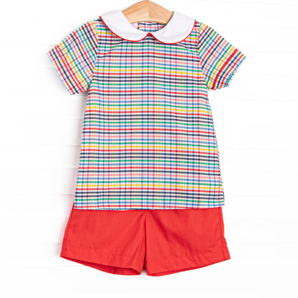 This set features a plaid top with a peter pan collar, and coordinating red shorts to match