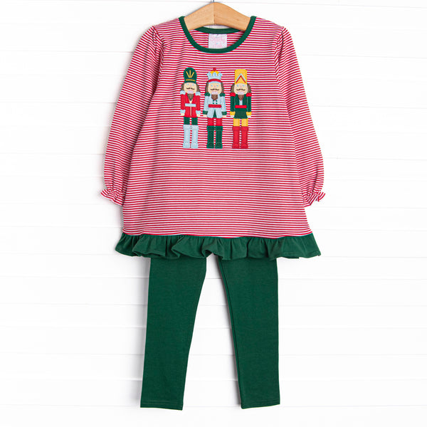 This set features a red striped print, green trim, and a trio of toy soldiers applique. Coordinating green leggings to match.