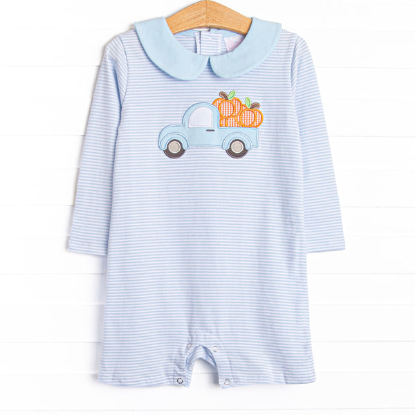 This romper features a blue striped print, a blue peter pan collar, and a pickup truck pumpkin applique.