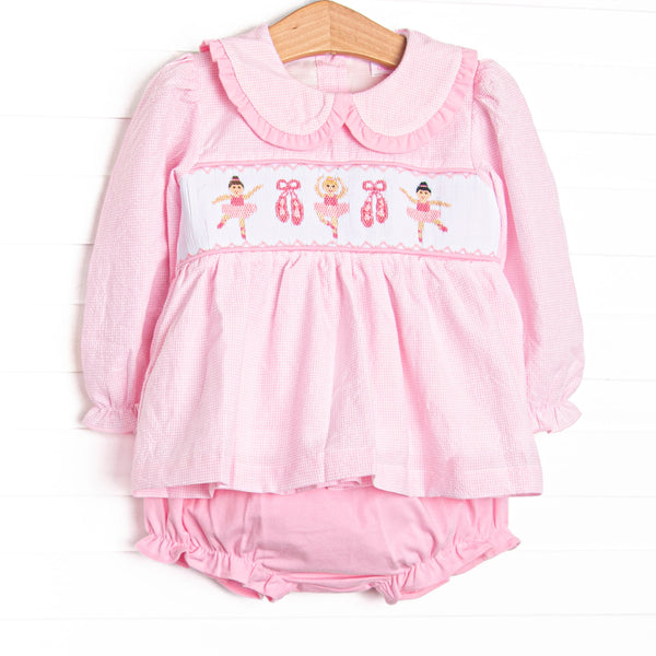 This set features pink mini gingham fabric, ballerina smocking, and a ruffle Peter Pan collar. Coordinated pink diaper cover to match.