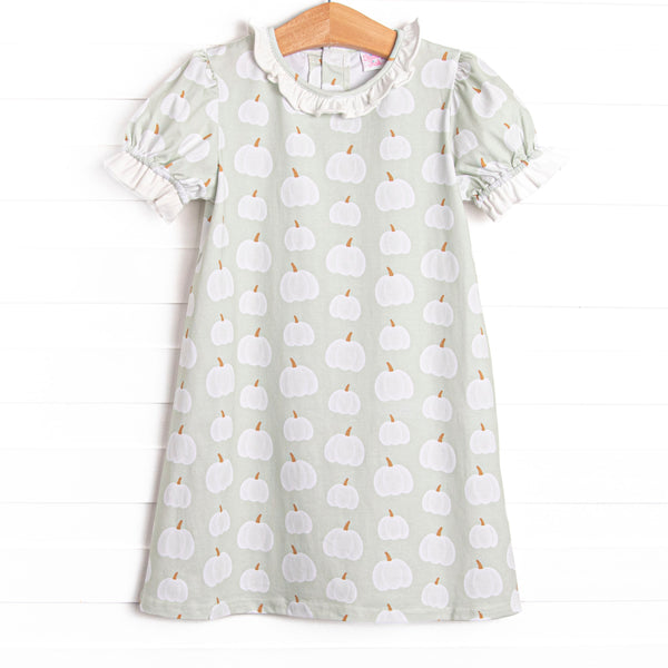 This bubble features a green pumpkin print, a ruffle collar, and puff sleeves.