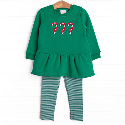 This set features a green sweatshirt material, a trio of candy cane appliques, and green striped leggings to match.