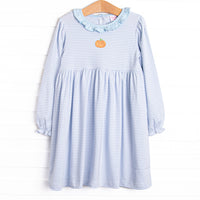 This precious dress&nbsp; features blue stripes, a pumpkin embroidery, and the softest Pima cotton.
