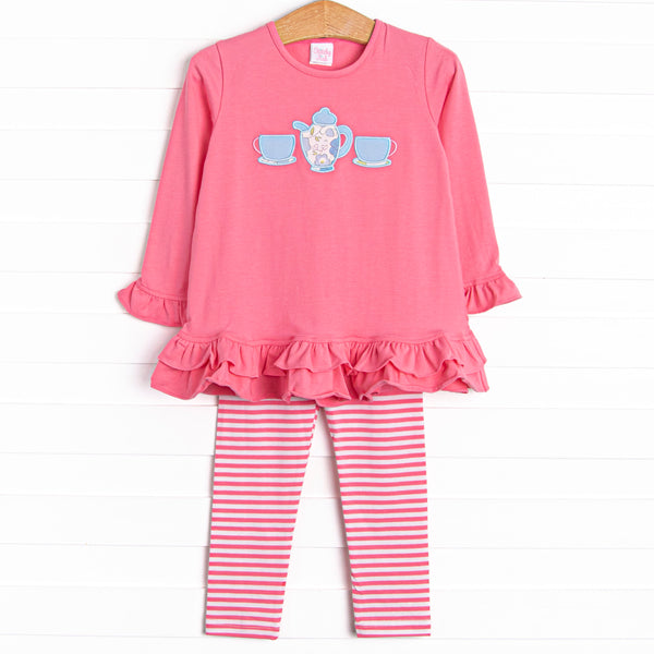 This adorable legging set features a tea set applique, tiered ruffles, and matching pink and white striped leggings.