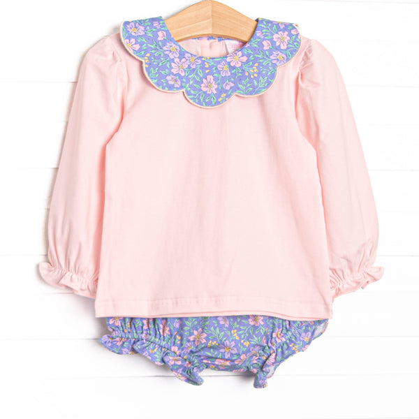 This set features a pink top, floral Peter Pan collar, and purple floral diaper cover to match.