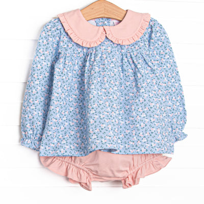 This set features a blue floral print, a pink Peter Pan collar, and long sleeves. Coordinating pink diaper cover to match.