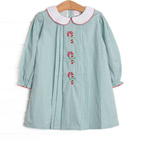 This dress features a sage green gingham, a peter pan collar, and candy cane embroideries.