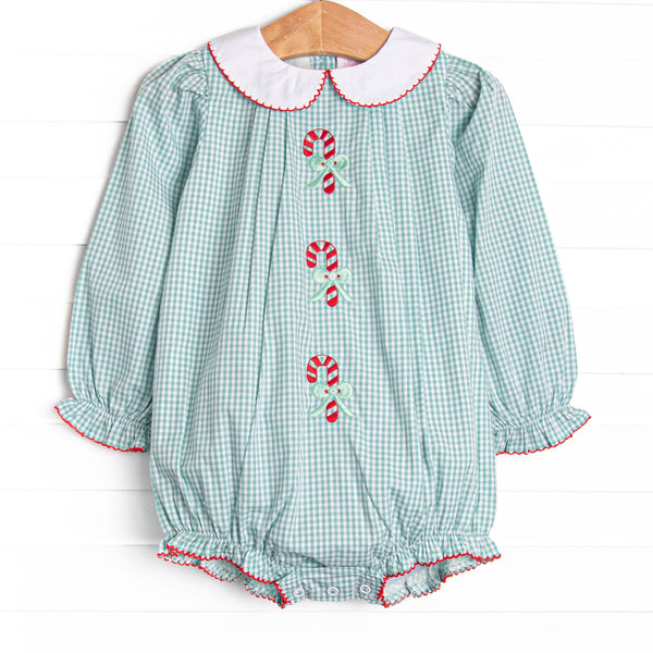 This bubble features a sage green gingham, a peter pan collar, and candy cane embroideries.