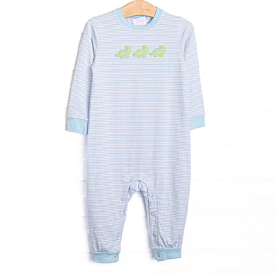  This romper features a blue striped fabric, dinosaur appliques, and snaps along the stride to make changing a breeze. 