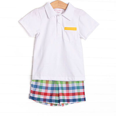 This set features a polo top with yellow trim and primary color check shorts to match.