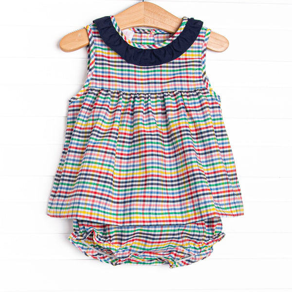 This set features a plaid print, a navy blue ruffle collar, and matching diaper cover