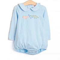  This bubble features blue knit fabric, dinosaur appliques, and a blue Peter Pan collar. 