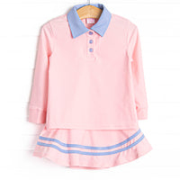  This set features a pink material, a blue collar, the best performance fabric and a coordinating skort. 