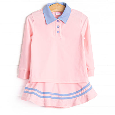  This set features a pink material, a blue collar, the best performance fabric and a coordinating skort. 
