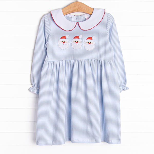 This dress features soft blue stripes, peter pan collar, and a Santa trio applique.